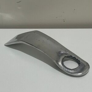 Freestanding wine bottle holder made from‎ recycled aluminum